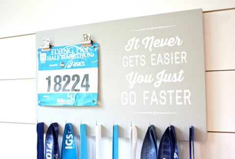 Medal Holder - It Never Gets Easier You Just Go Faster - Running / Cycling / Triathlon / Track / Cross Country - York Sign Shop - 1